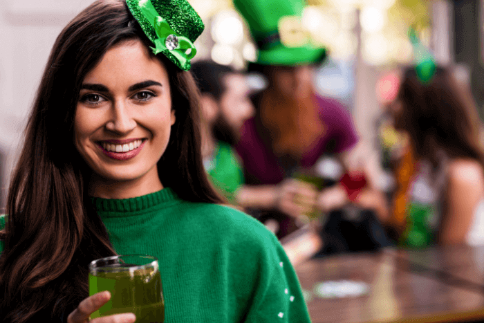 Irish woman in green smiling