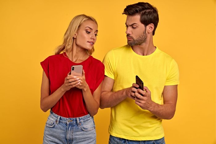 Woman wearing red shirt, man wearing yellow shirt